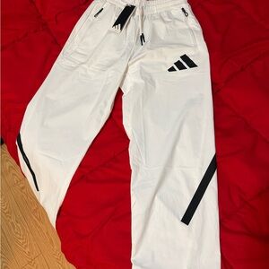 Adidas Men's White Joggers with Black Stripes